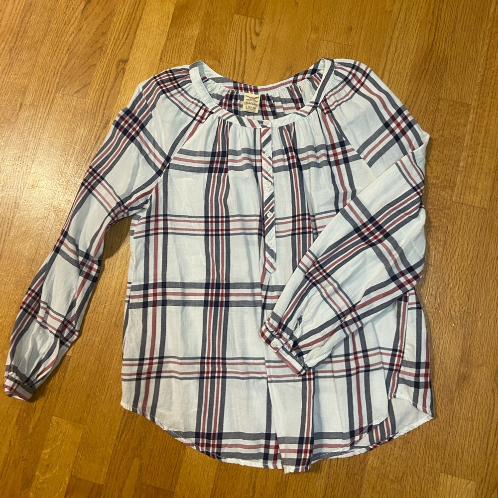 Loose fitting half button shirt